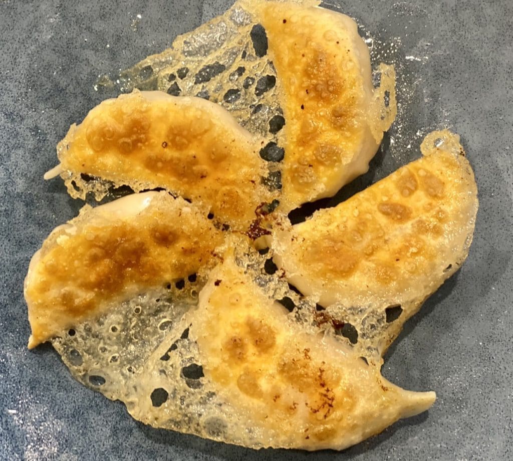 cooking prawn pork potstickers