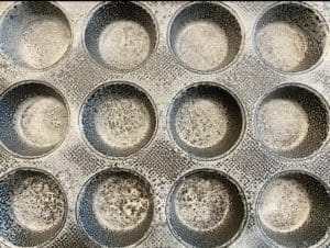 greasing muffin tins