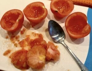 removing tomato pulp and seeds