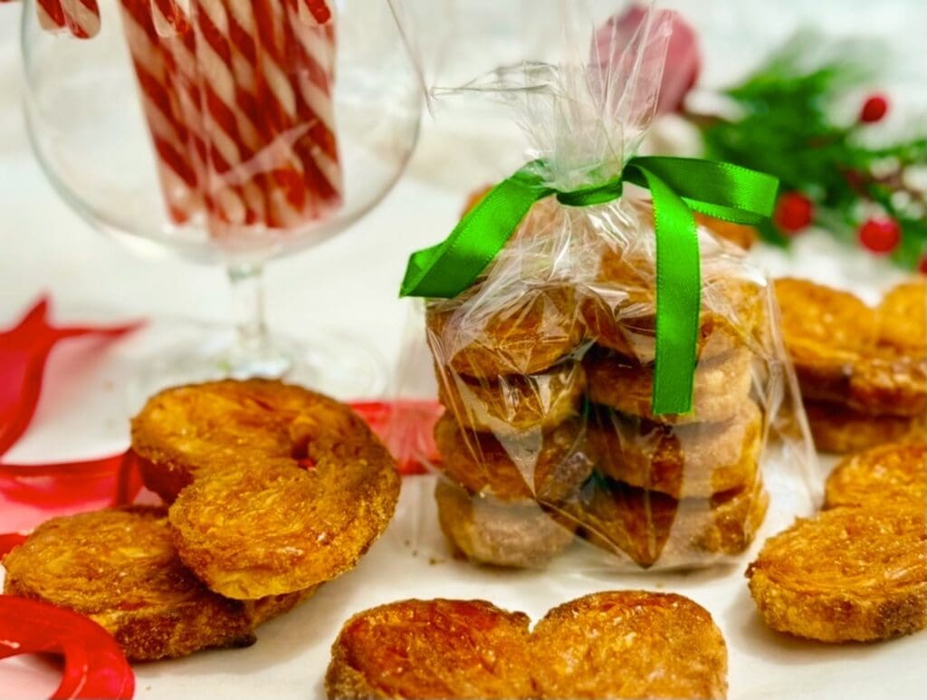 Christmas gift wrapped brown sugar palmiers in festive ribbons